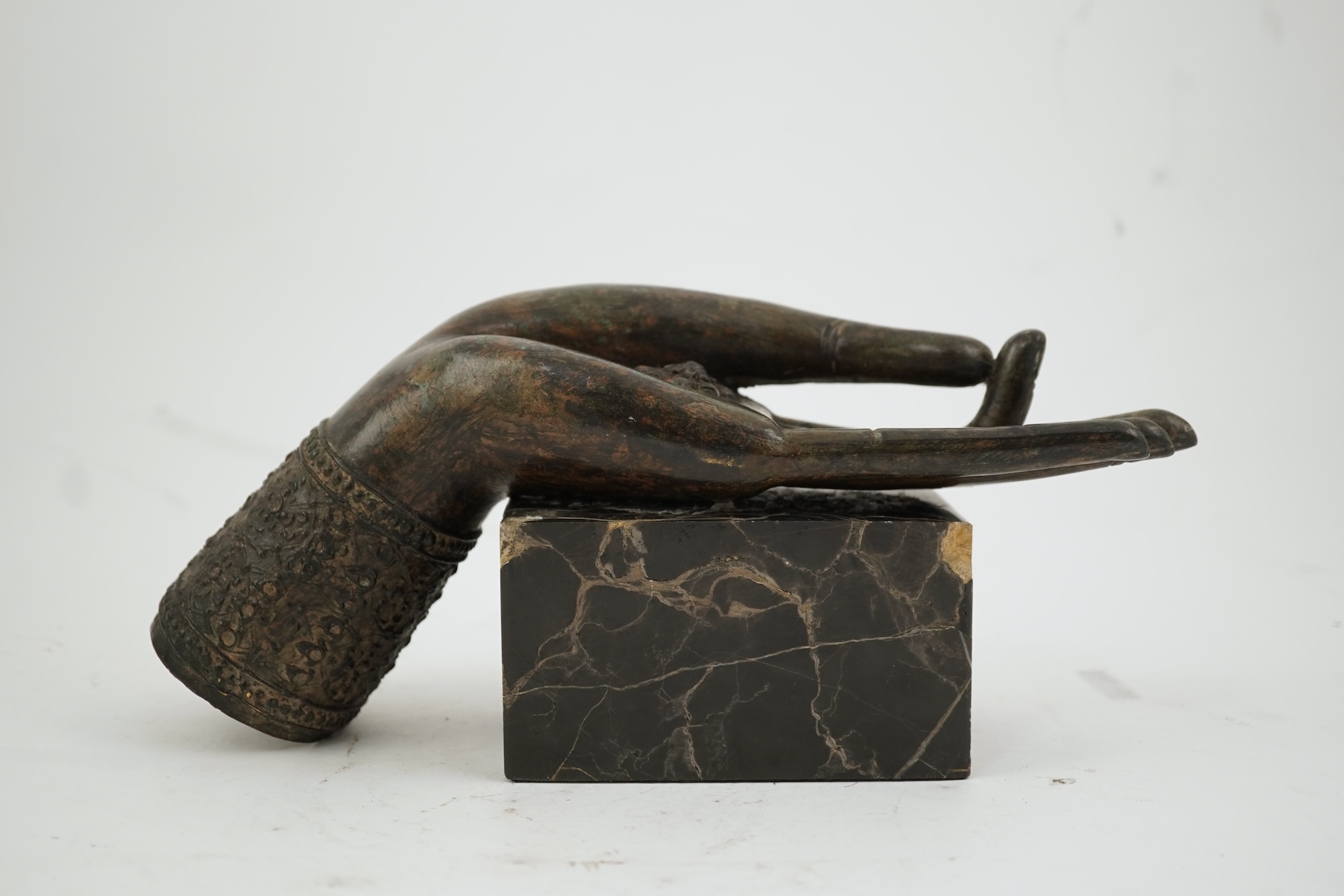 A Thai bronze Buddha's hand, 17th/18th century